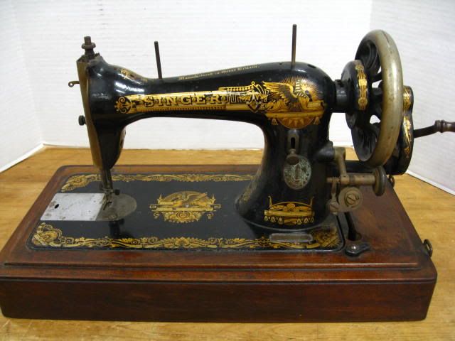 This is an antique sewing machine from around 1902 made by the largest name in sewing, Singer. This antique Singer has the Egyptian motif.