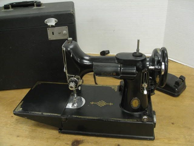 Singer featherweight sewing machine.
